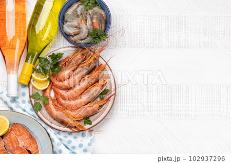 Seafood and Wine on a Table Seafood and Wine on a Table 102937296