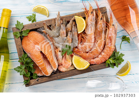 Seafood and Wine on a Table 102937303