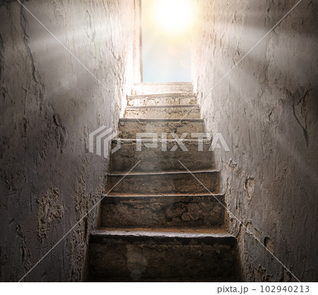 Steps from the dark basement to the light 102940213