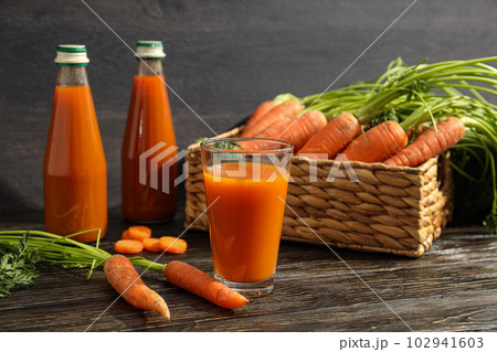 Concept of healthy nutrition and diet with Carrot juice Concept of healthy nutrition and diet with Carrot juice 102941603