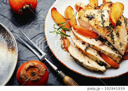 Chicken meat cooked with persimmon. Chicken meat cooked with persimmon. 102941939