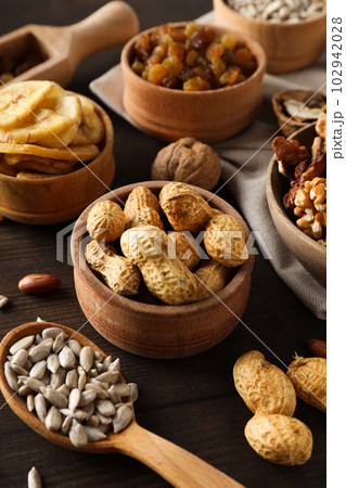Tasty food concept - delicious dried fruits, tasty dried food 102942028