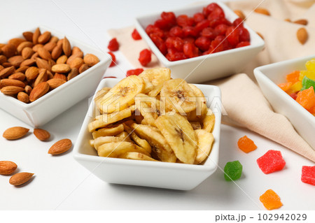 Tasty food concept - delicious dried fruits, tasty dried food 102942029
