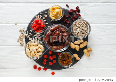 Tasty food concept - delicious dried fruits, tasty dried food 102942043