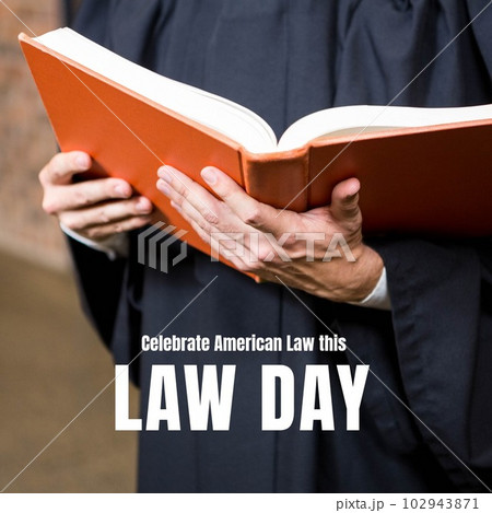 Combination of law day text over caucasian male lawyer holding book 102943871