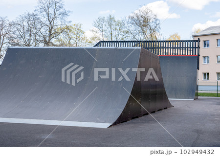Extreme sports ramps in the city park. Leisure time 102949432