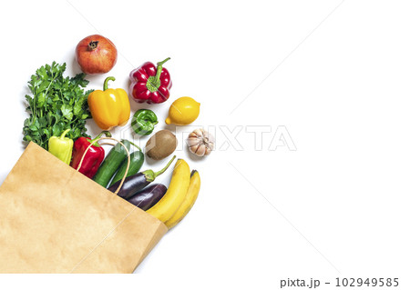 Eco friendly paper shop bag with raw organic green vegetables isolated on white background Flat lay, top view Zero waste, plastic free concept Healthy clean eating diet and detox, agriculture concept. 102949585