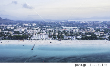 Mallorca sandy beach in Alcudia aerial view. Mallorca sandy beach in Alcudia aerial view. 102950126