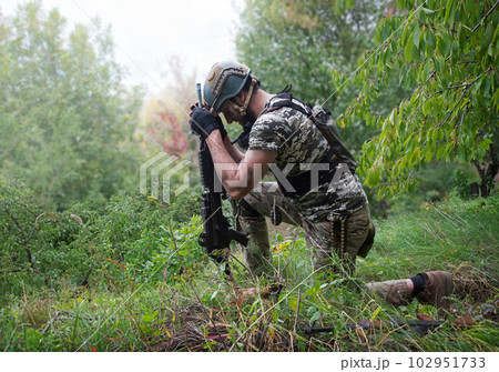 A soldier in the grass pray God 102951733
