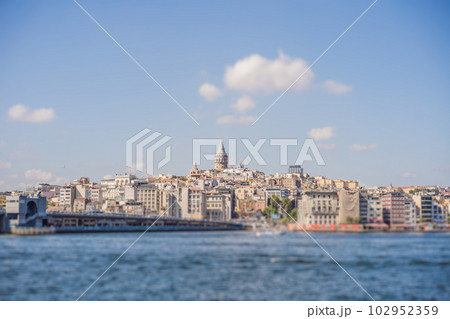 Istanbul city skyline in Turkey, Beyoglu district old houses with Galata tower on top, view from the Golden Horn 102952359
