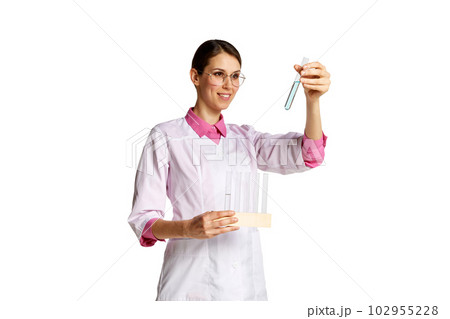 Young woman, doctor, nurse holding lab tube, medical tests isolated over white background. Health checkup 102955228