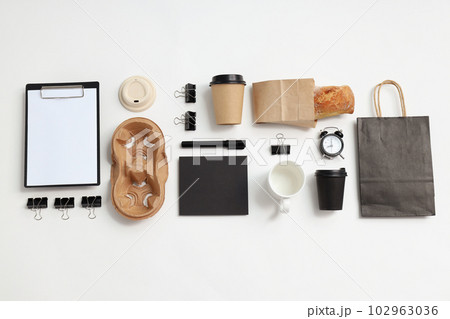 Mockup flat lay with different office accessories on white background 102963036