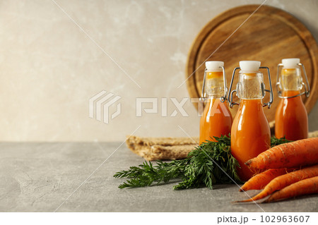 Concept of healthy nutrition and diet with Carrot juice 102963607