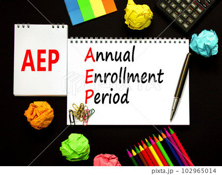 AEP symbol. Concept words AEP Annual enrollment period on beautiful white note. Beautiful black table black background. Calculator. Medical and AEP Annual enrollment period concept. Copy space. AEP symbol. Concept words AEP Annual enrollment period on beautiful white note. Beautiful black table black background. Calculator. Medical and AEP Annual enrollment period concept. Copy space. 102965014