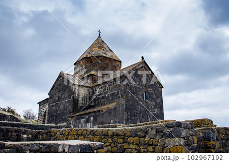 Monastery located on the shore of Lake Sevan concept photo. 102967192