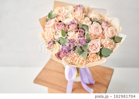 Beautiful bouquet of flowers on table. Floral shop concept . Beautiful fresh cut bouquet. Flowers delivery 102981704