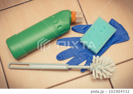 Domestic detergent and accessories for cleaning toilet. Household duties Domestic detergent and accessories for cleaning toilet. Household duties 102984532