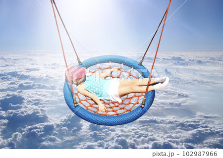 Flight over clouds. Wonderful panorama from window of plane with white clouds 102987966