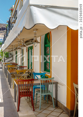 A street scene in Puerto de Mogan Gran Canaria, Canary Islands, Spain 102988949
