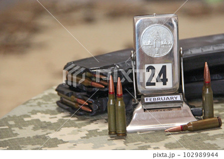 russian-Ukrainian war on 24 of February 2022. War Concept. Pile of bullets 102989944