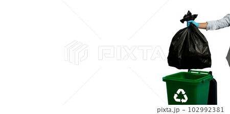 male person hand holding garbage black to bin trash full junk plastic at home responsibility environmental bio clean concept 102992381