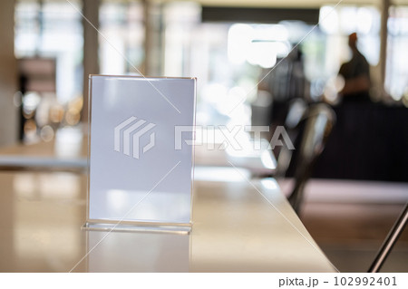 Stand Mock up Menu frame tent card blurred background design key visual layout in cafe 102992401