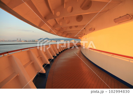 A picture of the open deck at the front of the ship. A picture of the open deck at the front of the ship. 102994830