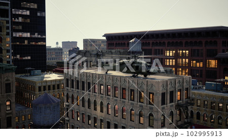 military helicopter in big city 102995913