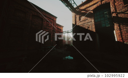 Old abandoned industrial street view with brick facades 102995922