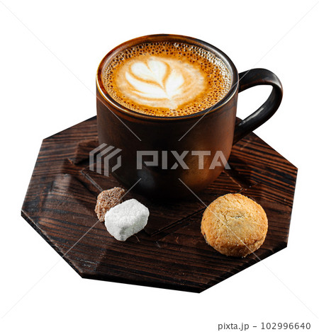 Isolated portion of cappuccino coffee with cookie Isolated portion of cappuccino coffee with cookie 102996640