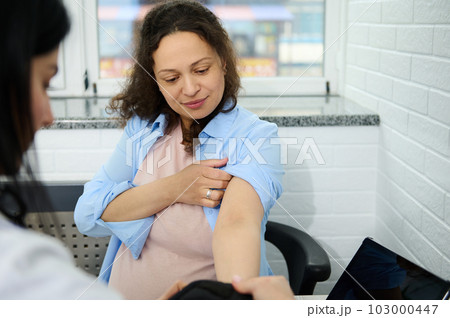 Pregnant woman visits obstetrician-gynecologist for regular check-up during pregnancy in gynecological clinic. Blood pressure measurement to prevent eclampsia. Pregnancy-induced Hypertension concept Pregnant woman visits obstetrician-gynecologist for regular check-up during pregnancy in gynecological clinic. Blood pressure measurement to prevent eclampsia. Pregnancy-induced Hypertension concept 103000447