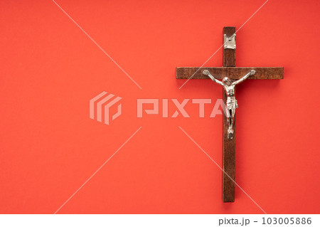 Christian Pentecost. Whit Sunday. A cross with a birch branch on a white, green, red and black background. Christian Pentecost. Whit Sunday. A cross with a birch branch on a white, green, red and black background. 103005886
