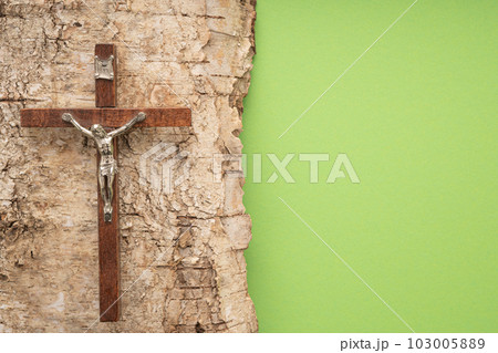 Christian Pentecost. Whit Sunday. A cross with a birch branch on a white, green, red and black background. 103005889