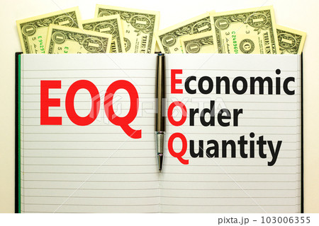 EOQ economic order quantity symbol. Concept words EOQ economic order quantity on white note on beautiful background from dollar bills. Pen. Business EOQ economic order quantity concept. Copy space. EOQ economic order quantity symbol. Concept words EOQ economic order quantity on white note on beautiful background from dollar bills. Pen. Business EOQ economic order quantity concept. Copy space. 103006355