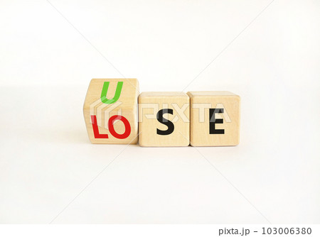 Use or lose symbol. Concept words Use or lose on wooden cubes. Businessman hand. Beautiful white table white background. Business Use or lose concept. Copy space. Use or lose symbol. Concept words Use or lose on wooden cubes. Businessman hand. Beautiful white table white background. Business Use or lose concept. Copy space. 103006380