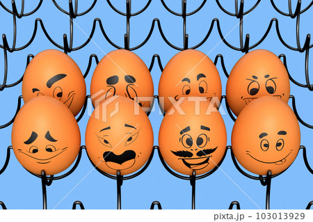 Farm brown egg with expressions and funny face in metal wire tray or cardboard 103013929