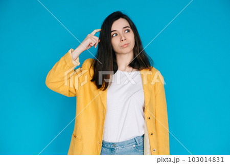 Intelligent Businesswoman in Thoughtful Pose - Professional Woman with Pouted Lips and Scratching Intelligent Businesswoman in Thoughtful Pose - Professional Woman with Pouted Lips and Scratching 103014831