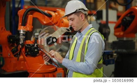 Programming robot controller, Programming robotic arms in factory industrial Programming robot controller, Programming robotic arms in factory industrial 103016990