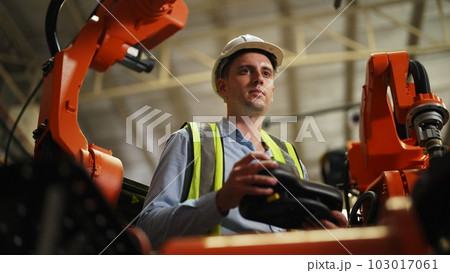 Professional male industrial engineer manager with safety uniform protection Professional male industrial engineer manager with safety uniform protection 103017061