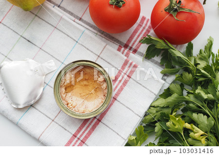 canned tuna on wooden table , 103031416