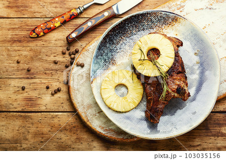 Roasted meat with pineapple. 103035156