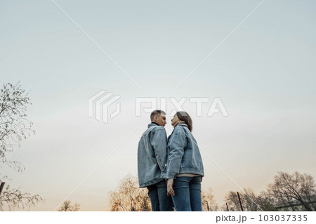 stunning sensual young couple in love posing at the sunset, happy lifestyle concept 103037335