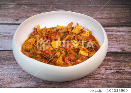 Recipe for octopus Provencal vegetables style Recipe for octopus Provencal vegetables style 103038969