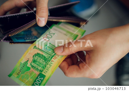 Russian rubles in the hands of a business man. Russian rubles in the hands of a business man. 103046713