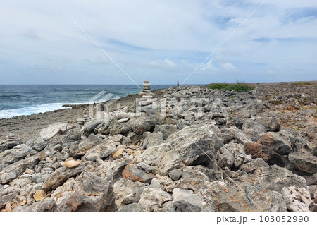 Pyramids of stones on the seashore. A pile of stones, towers 103052990