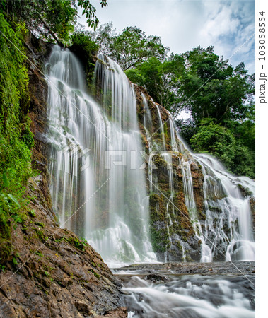 Long exposure of an amazing waterfall in Costa Rica rain forest 103058554