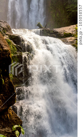 Close up of a waterfall in Costa Rica rainforest 103058557