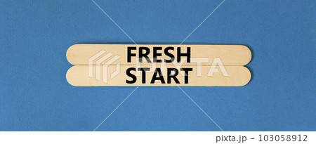 Fresh start and motivational symbol. Concept words Fresh start on beautiful wooden stick. Beautiful blue table blue background. Business motivational and Fresh start concept. Copy space. 103058912