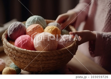 Women's hands and a basket with balls of thread. Neural network AI generated art Women's hands and a basket with balls of thread. Neural network AI generated art 103059726