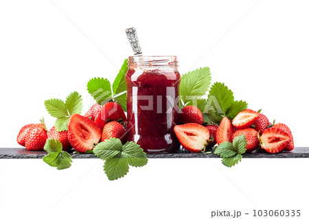 Strawberry jam and fresh berries are isolated on a white background. 103060335